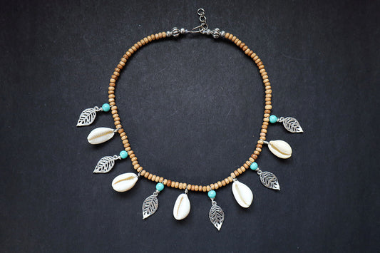Full view of wooden beads short necklace with cowrie, oxidized leaf charms – fashion jewellery for women