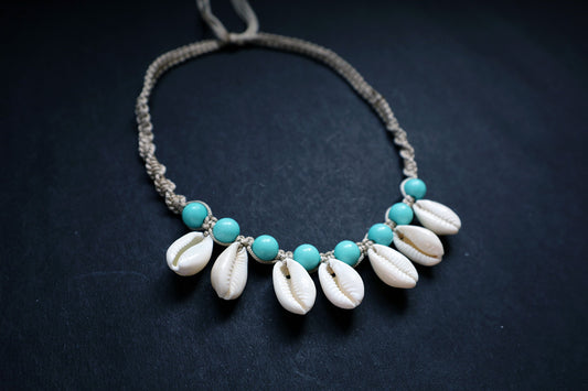 Perspective view of hemp weaved short necklace with plastic beads and cowrie – fashion jewellery for women