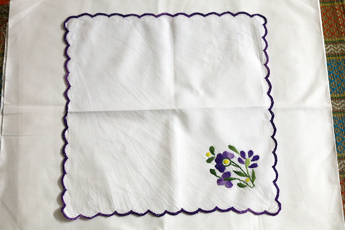 Full view of Violet Hand Embroidery Napkins featuring delicate violet and green embroidery on pure cotton fabric