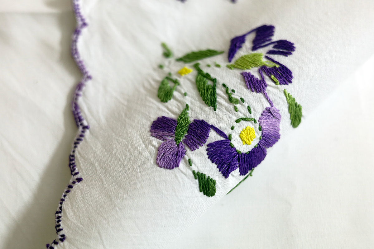 Reverse view of Violet Hand Embroidered Napkins, displaying the neat finish of the embroidery work