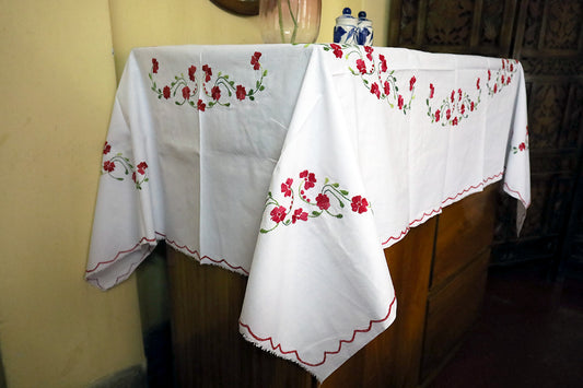 Side angle shot of Crimson Red Hand Embroidery Table Cloth highlighting its bold embroidery details.