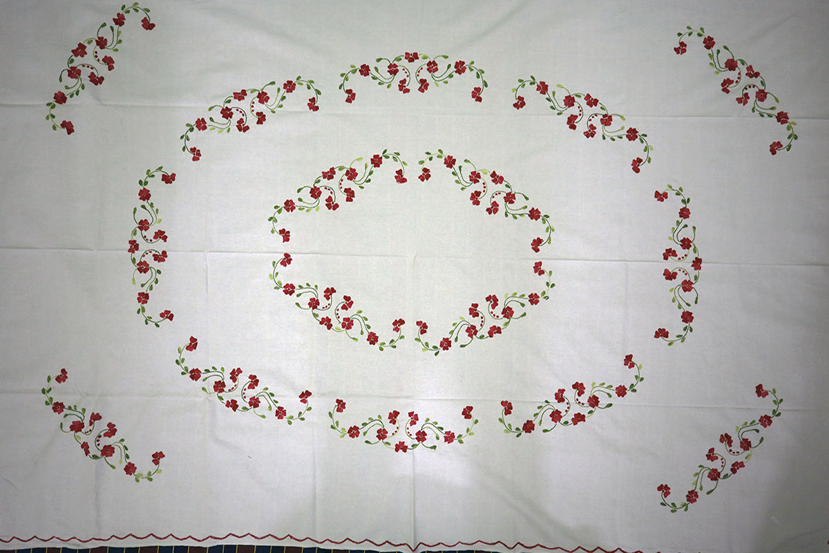 Complete top-angle view of Crimson Red Hand Embroidery Table Cloth styled with a chest of drawers, showing its elegant design.