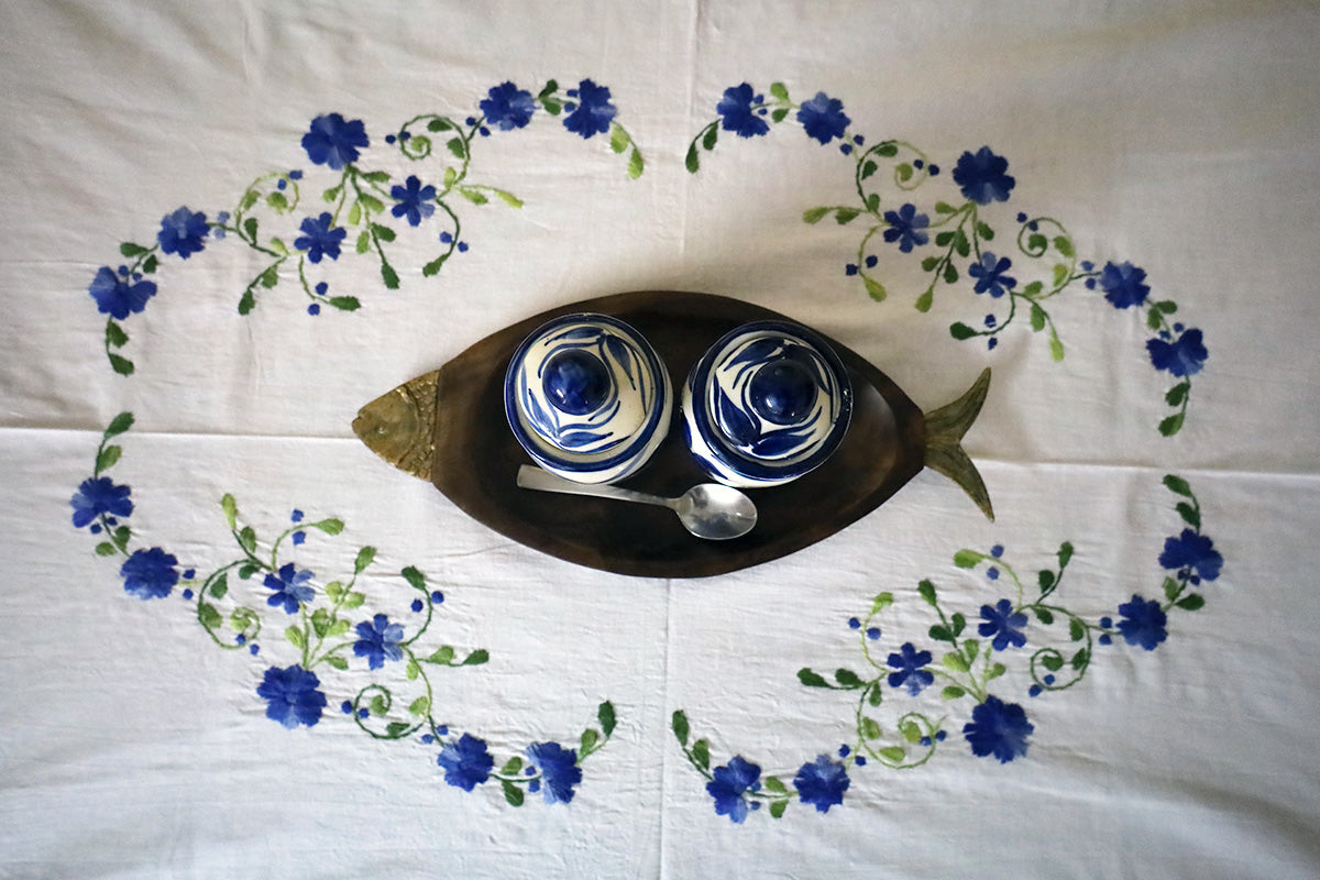 Top view of Navy Blue Hand Embroidery Table Cloth showcasing detailed patterns on a chest of drawers.