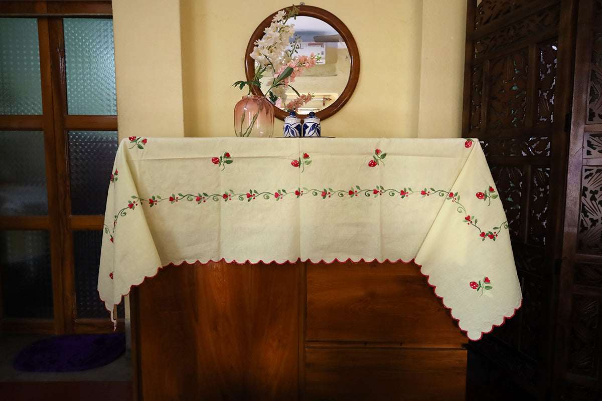 Full view of Wine Red Hand Embroidery Table Cloth styled with a chest of drawers, showcasing its rich, handcrafted embroidery.