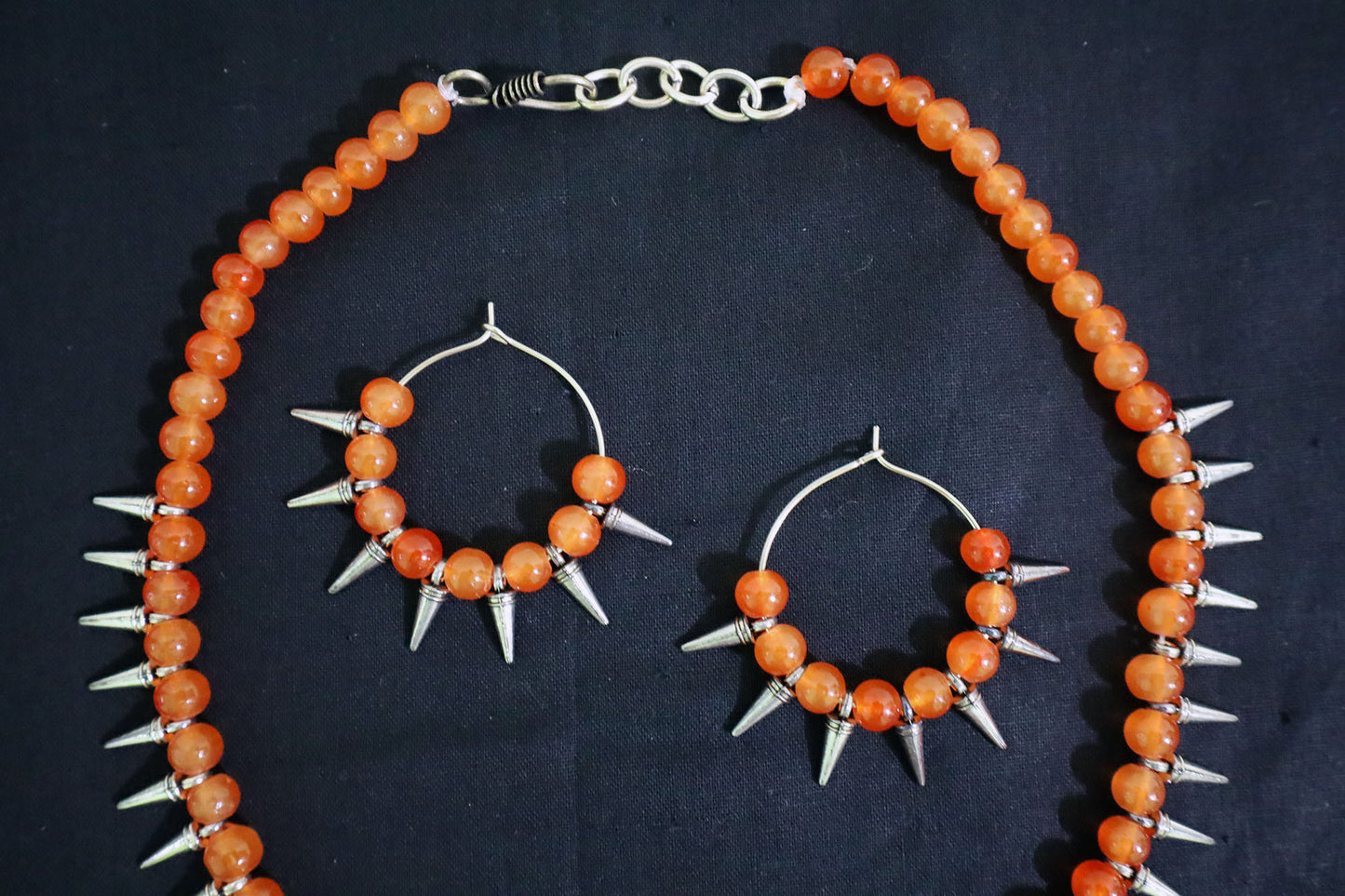 Close-up of top section of Orange Glass Beads Oxidized Cone Necklace Set – handmade jewellery