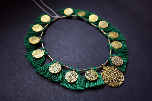 Perspective view of short ginni and tassel moss green colored necklace – fashion jewellery for women