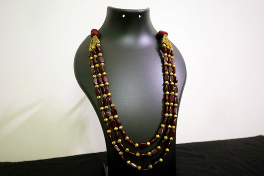 Closer view of 3 layered golden balls & oval glass beaded necklace on black mannequin - women fashion jewellery.