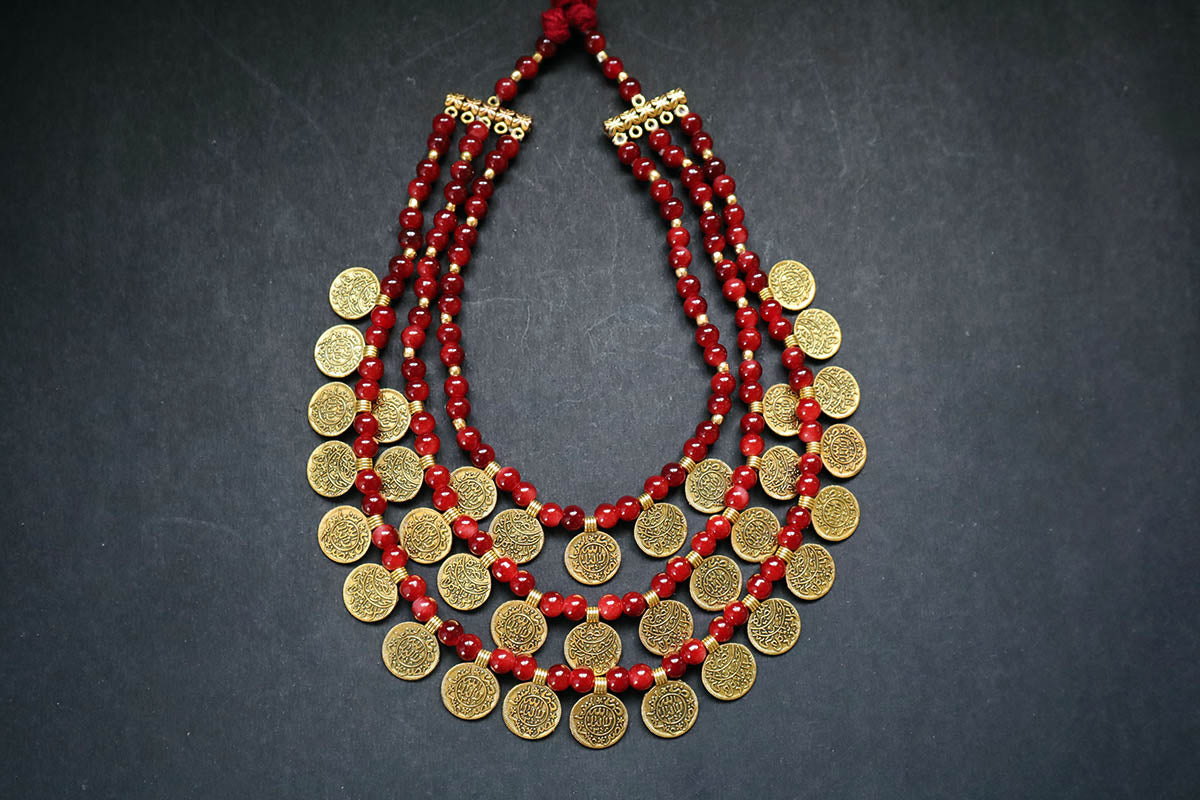 Full view of 3 layered golden ginni and glass beaded long necklace on a dark background – women fashion jewellery