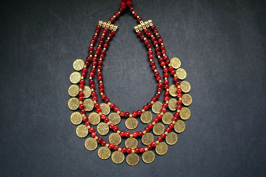 Full view of 3 layered golden ginni and glass beaded long necklace on a dark background – women fashion jewellery