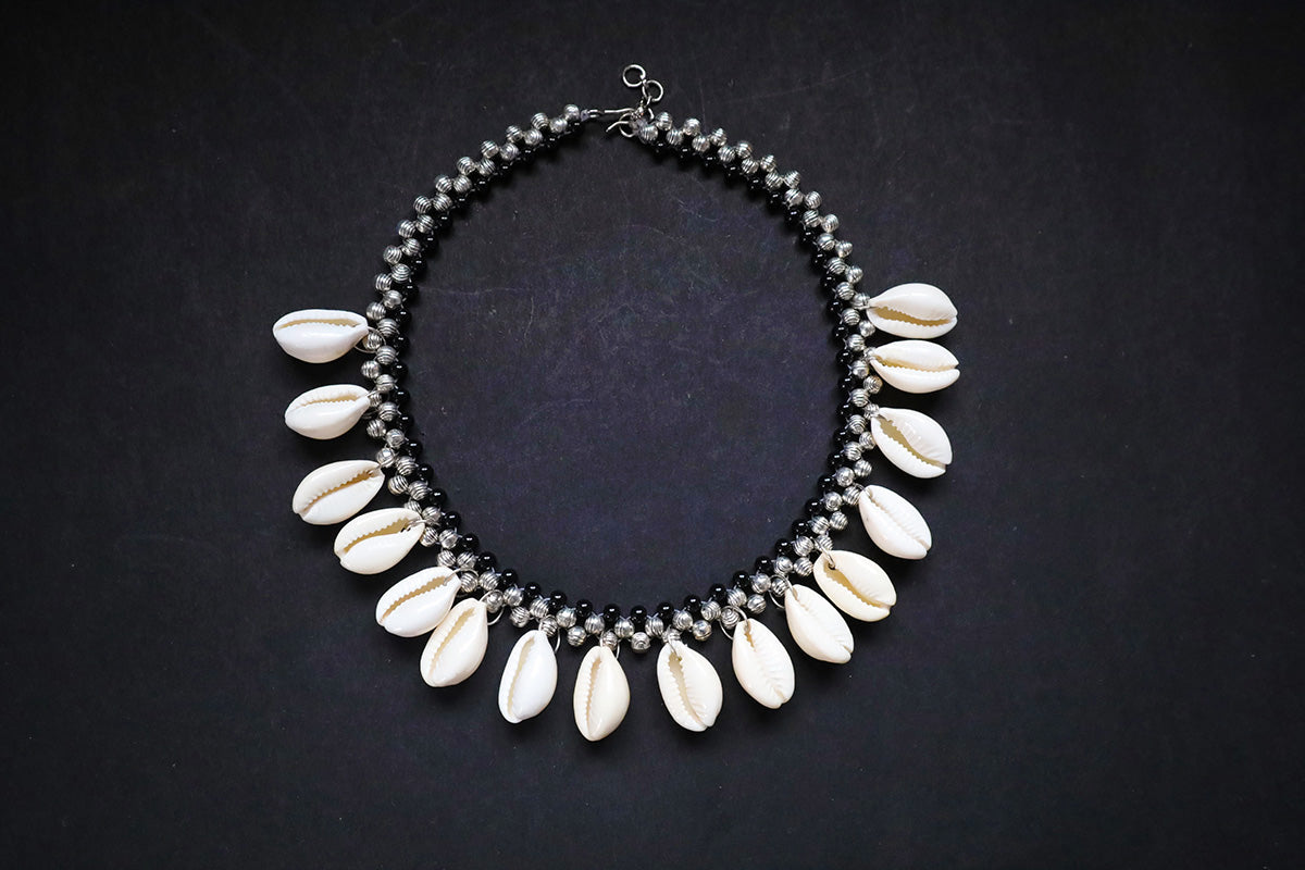 Full view of handmade metal beads and cowrie short necklace in silver color – fashion jewellery for women
