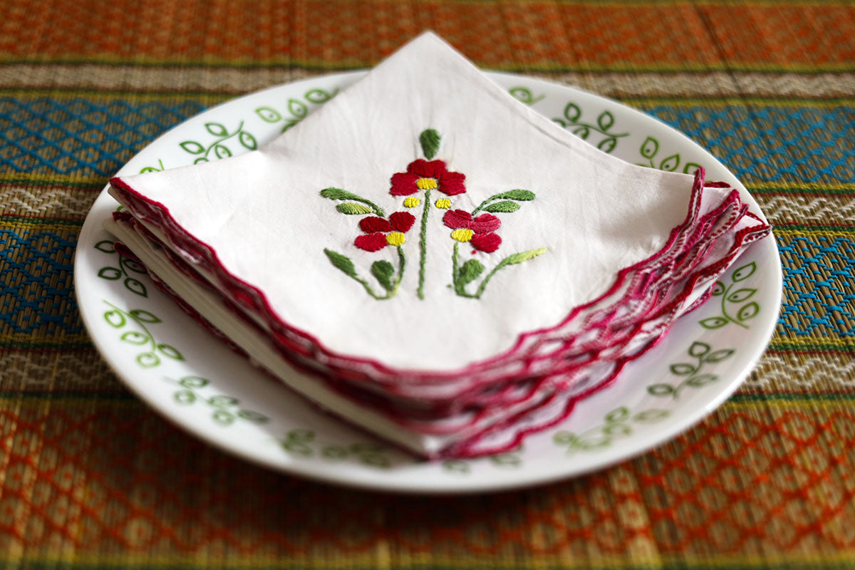 Side view of Crimson Red Hand Embroidery Napkins, highlighting the rich crimson embroidery on soft cotton