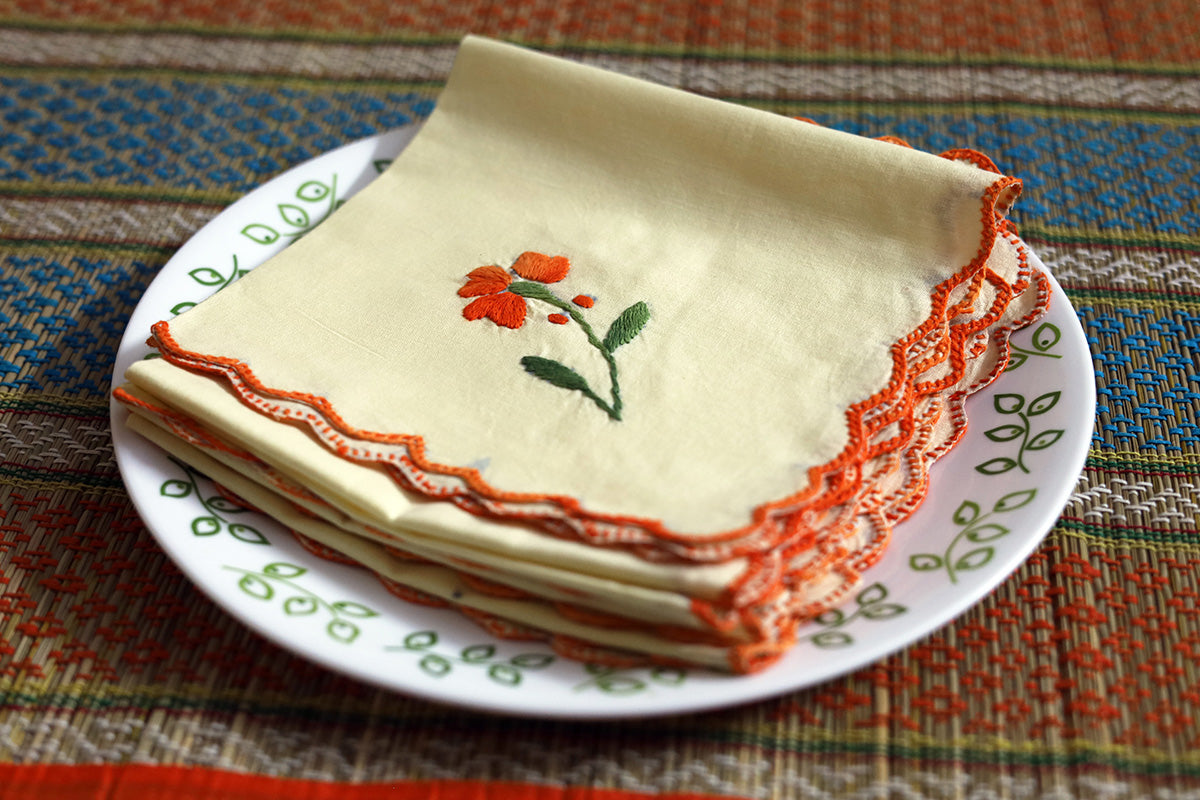 Side view of Orange Hand Embroidery Napkins Set of 4 showcasing intricate embroidered and rich works on cotton texture