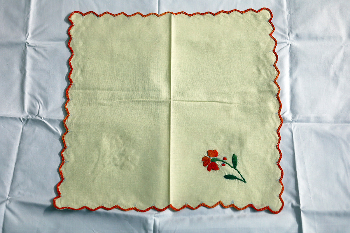 Full view of Orange Hand Embroidery Napkins with detailed orange and green threadwork on pure cotton fabric