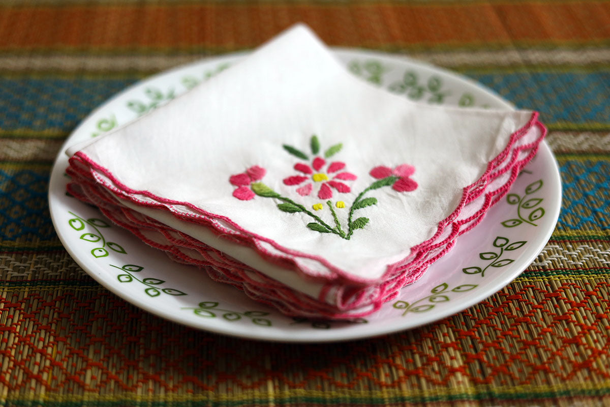 Side angle view of Pink Hand Embroidery Napkins, showing the soft cotton texture and delicate pink embroidery