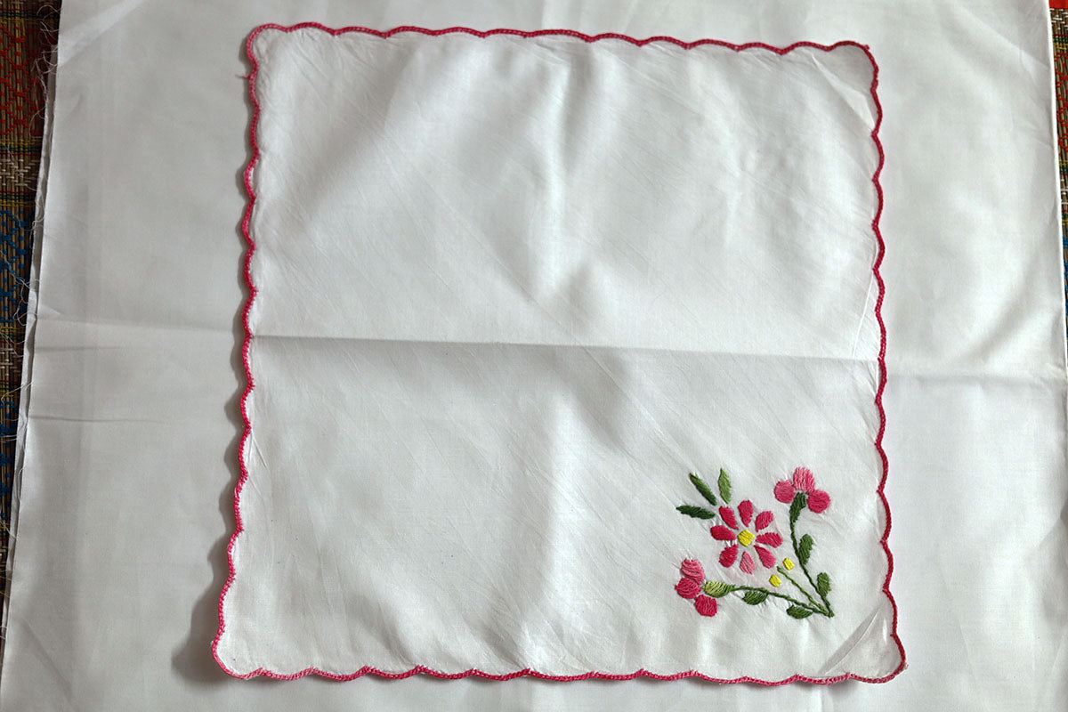 Full view of Pink Hand Embroidery Napkins, highlighting the beautiful hand-stitched pink and green embroidery