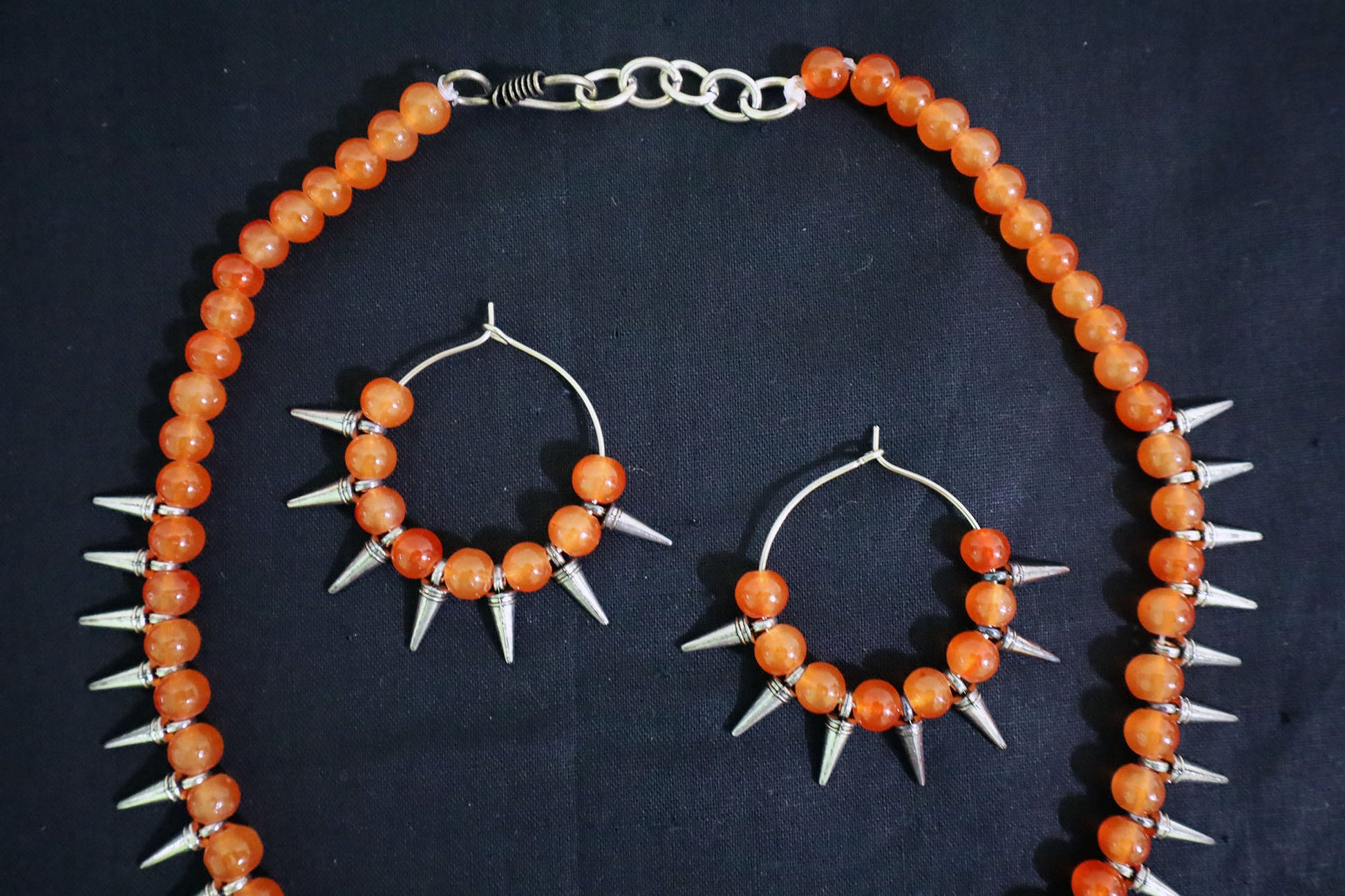 Close-up of top section of Orange Glass Beads Oxidized Cone Necklace Set – handmade jewellery