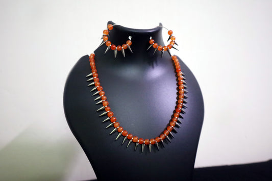 Closer view of Orange Glass Beads Oxidized Cone Necklace Set on mannequin – handmade fashion jewellery
